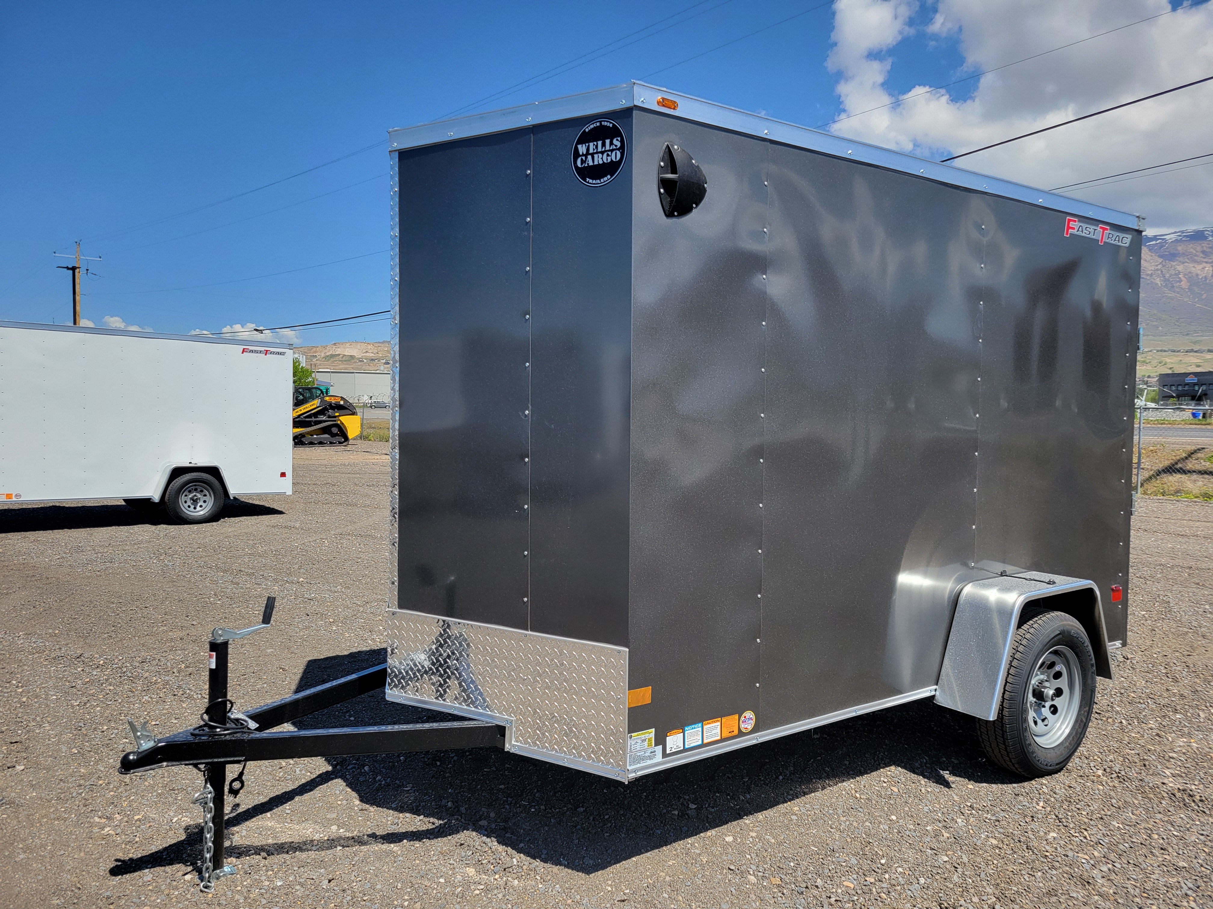 2025 Wells Cargo 6 x 10 Deluxe Enclosed Trailer