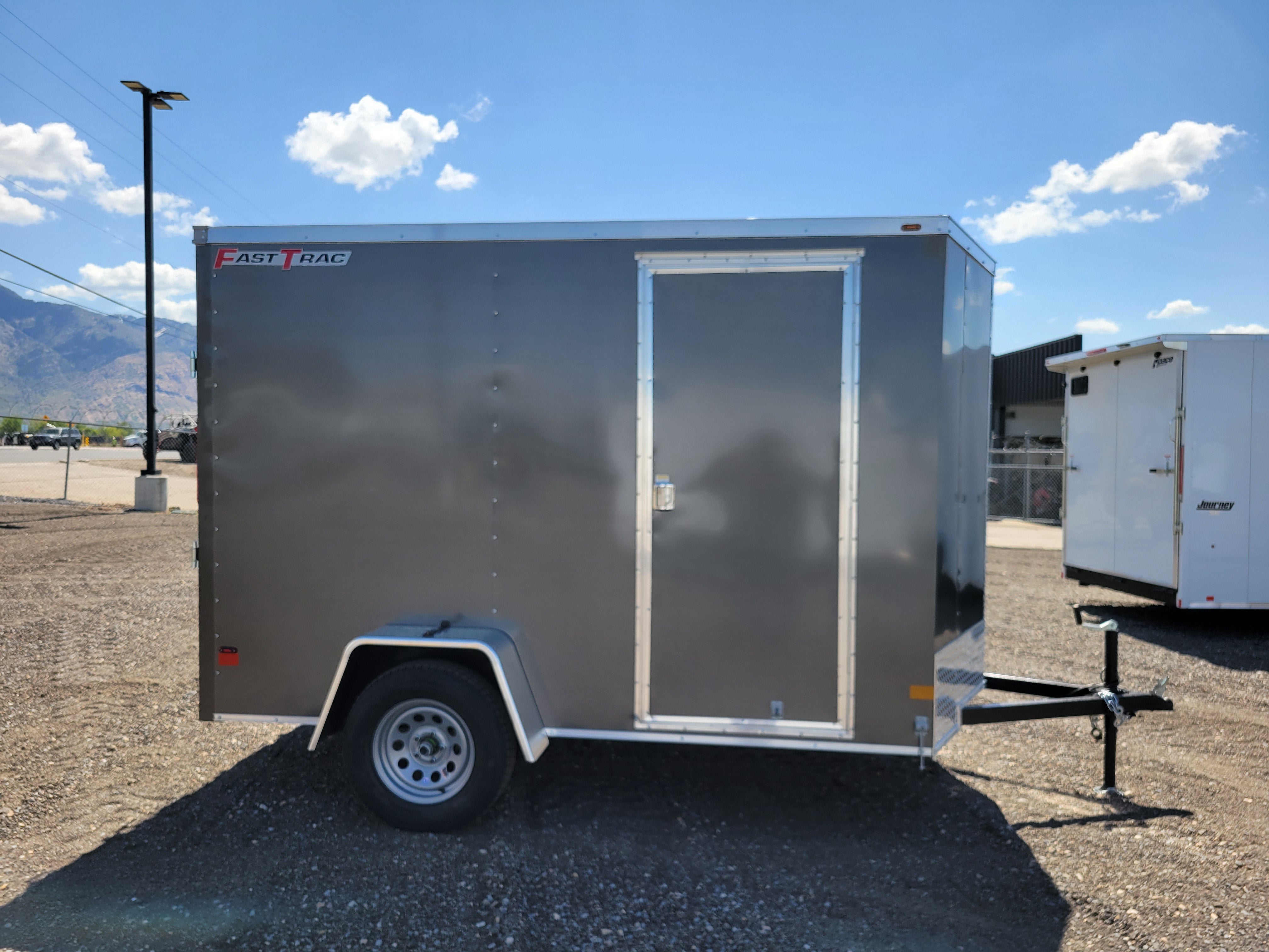 2025 Wells Cargo 6 x 10 Deluxe Enclosed Trailer