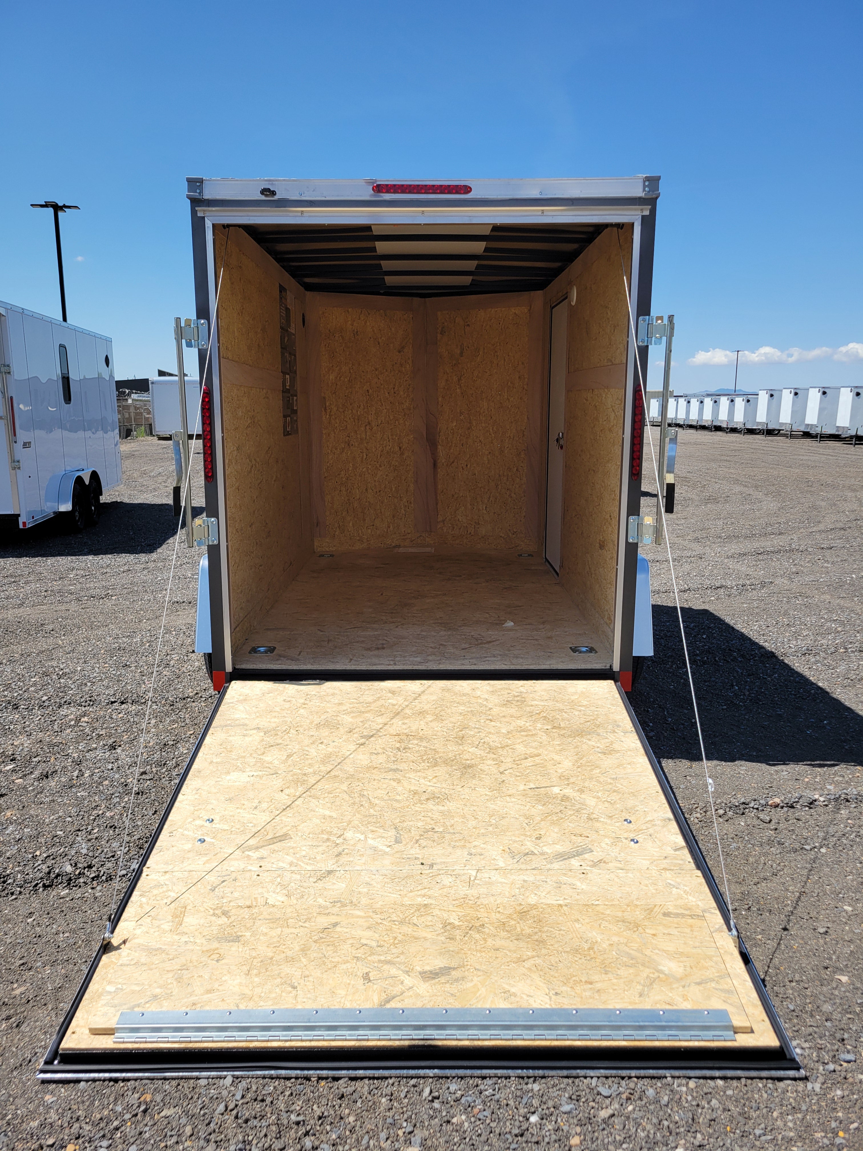 2025 Wells Cargo 6 x 10 Deluxe Enclosed Trailer