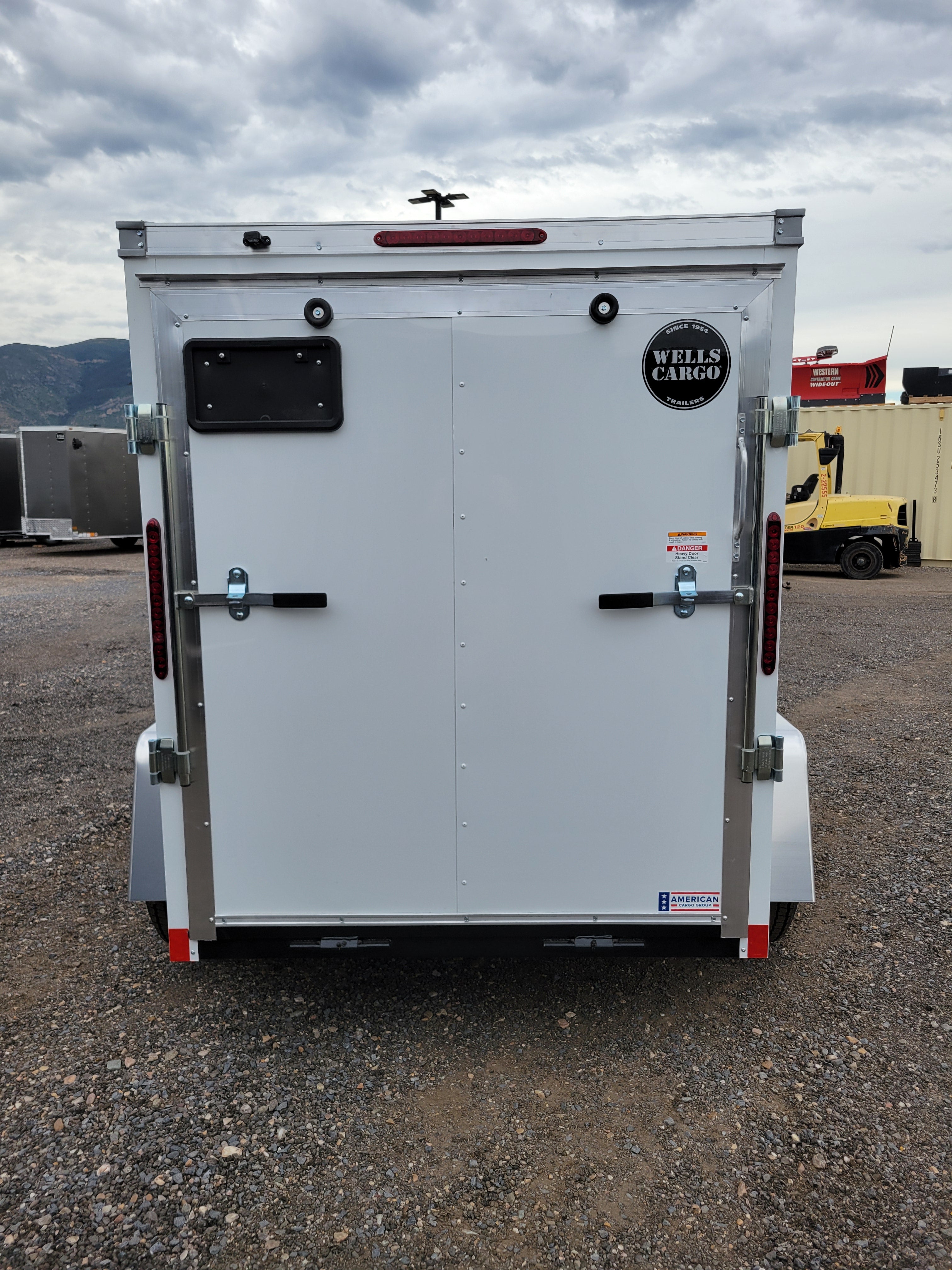 2026 Wells Cargo 5 x 8 Deluxe Enclosed Trailer