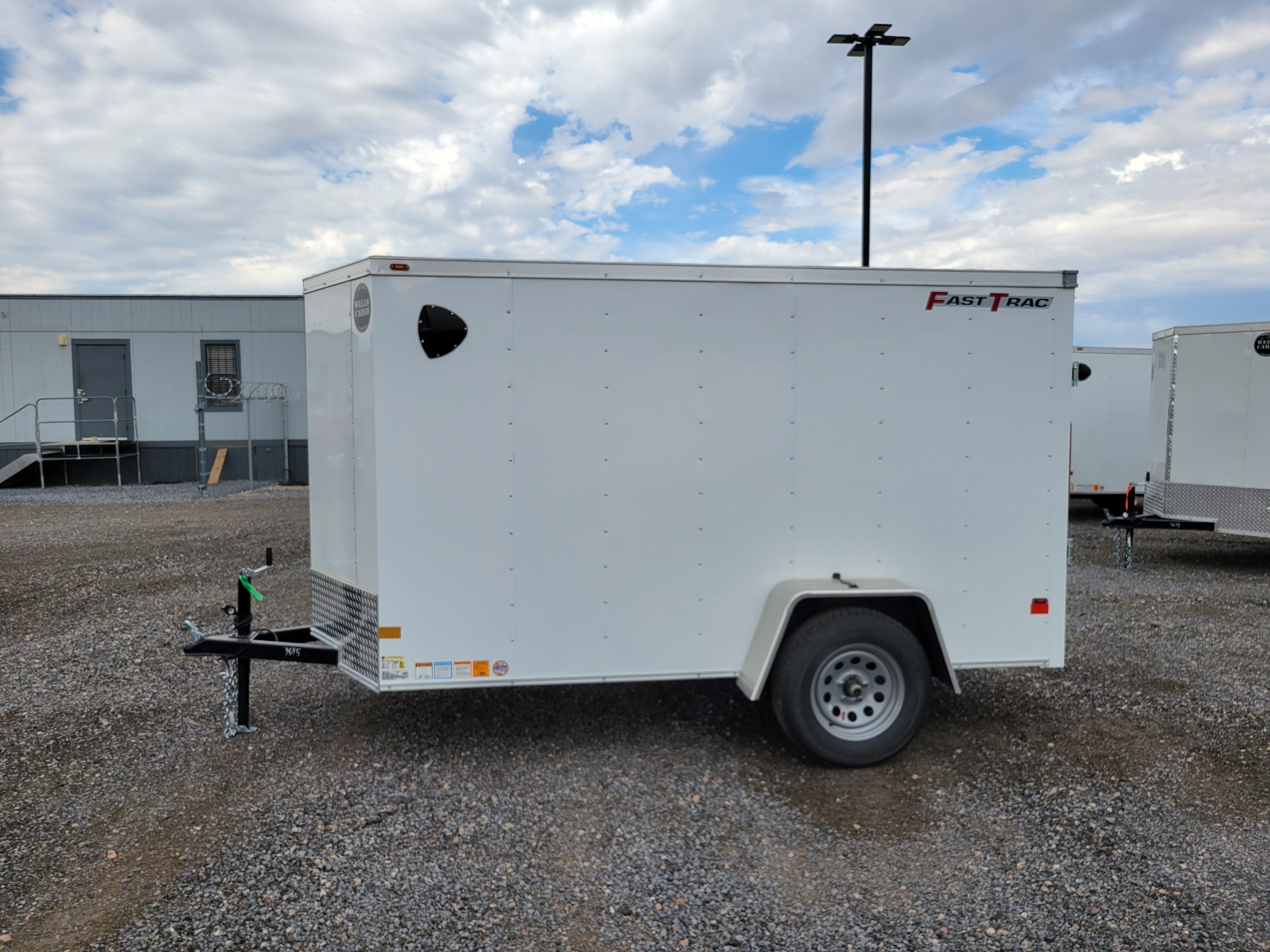 2026 Wells Cargo 6 x 10 Enclosed Trailer