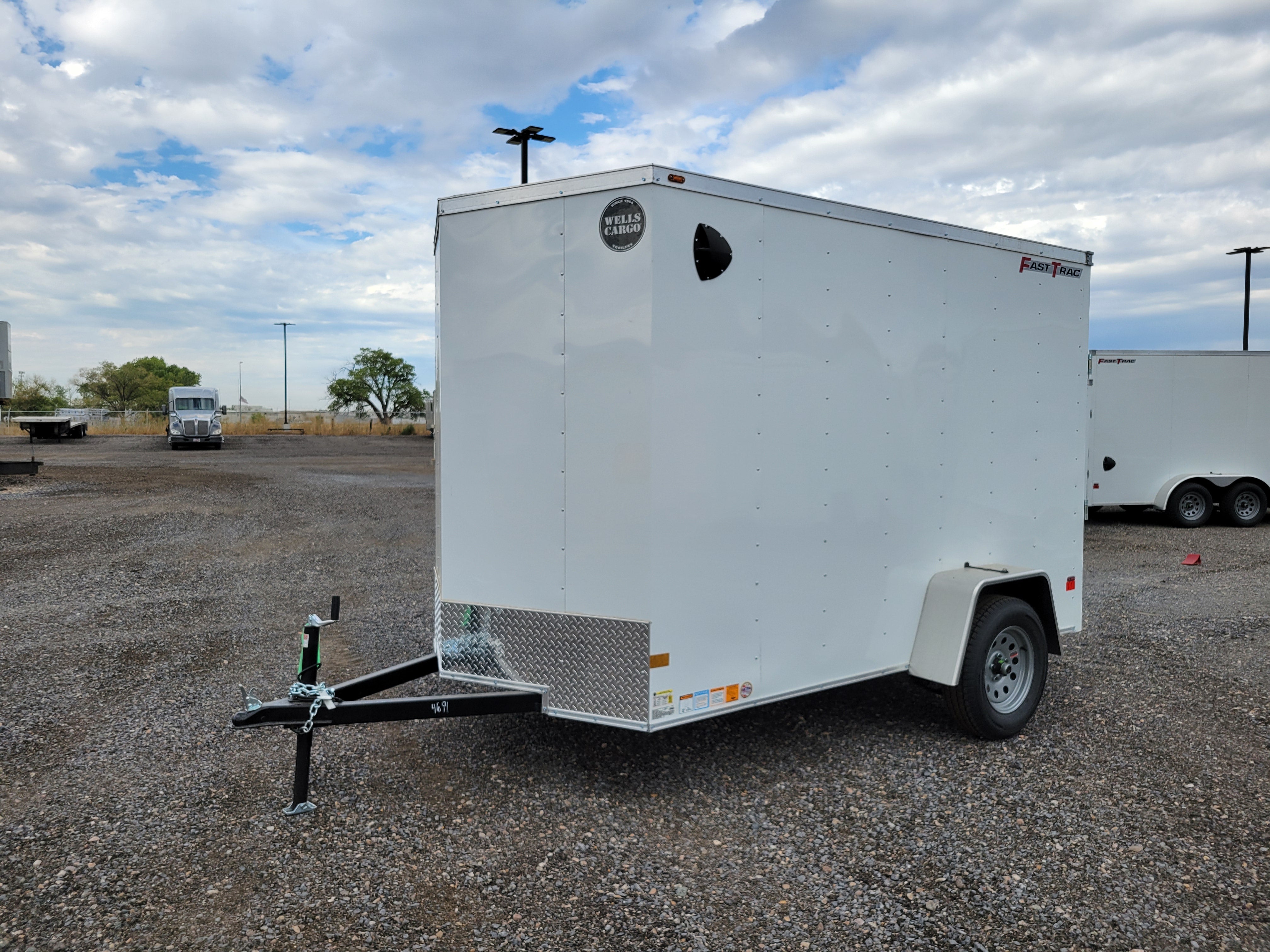2026 Wells Cargo 6 x 10 Enclosed Trailer