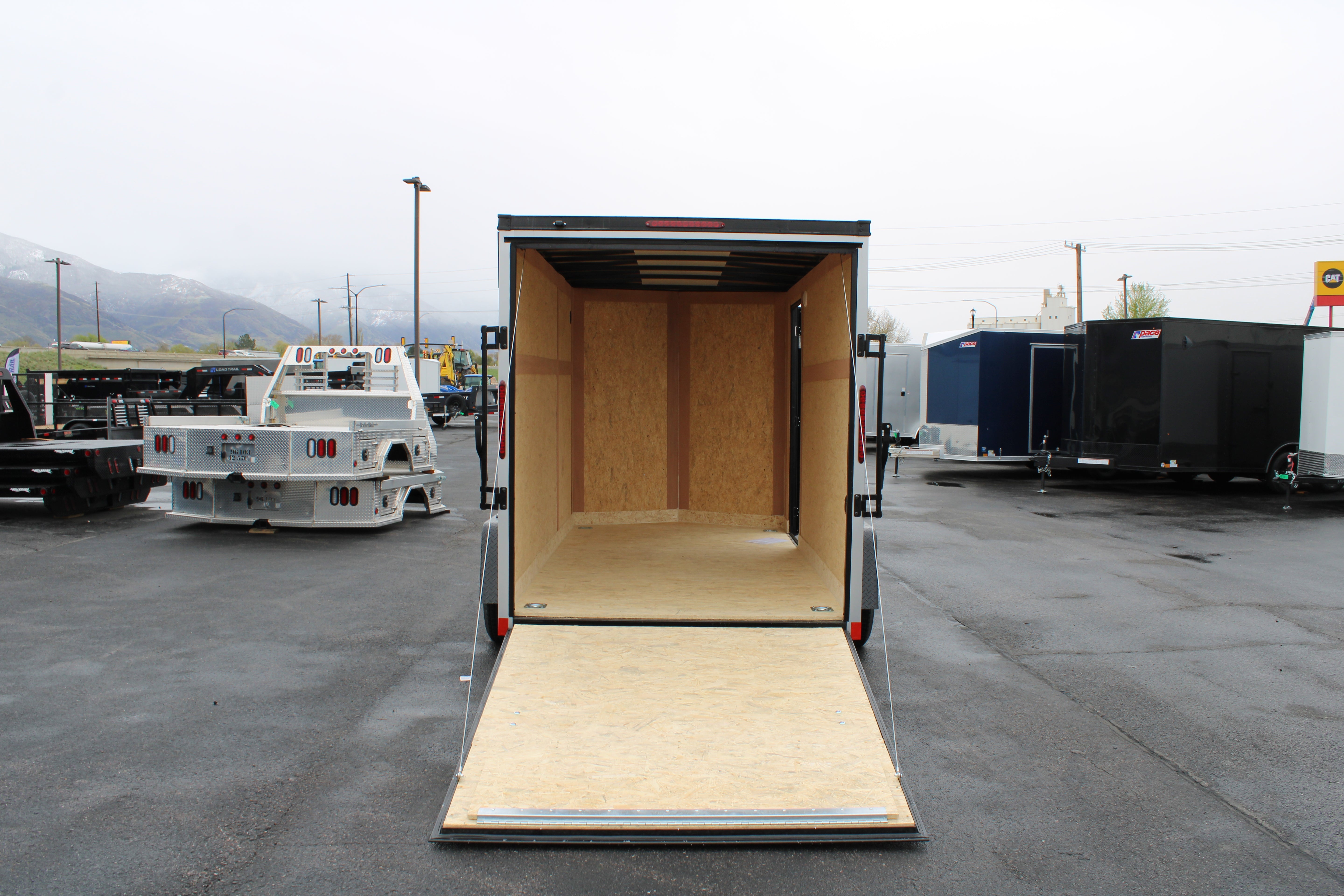 2025 Wells Cargo 6 x 12 Deluxe Enclosed Trailer