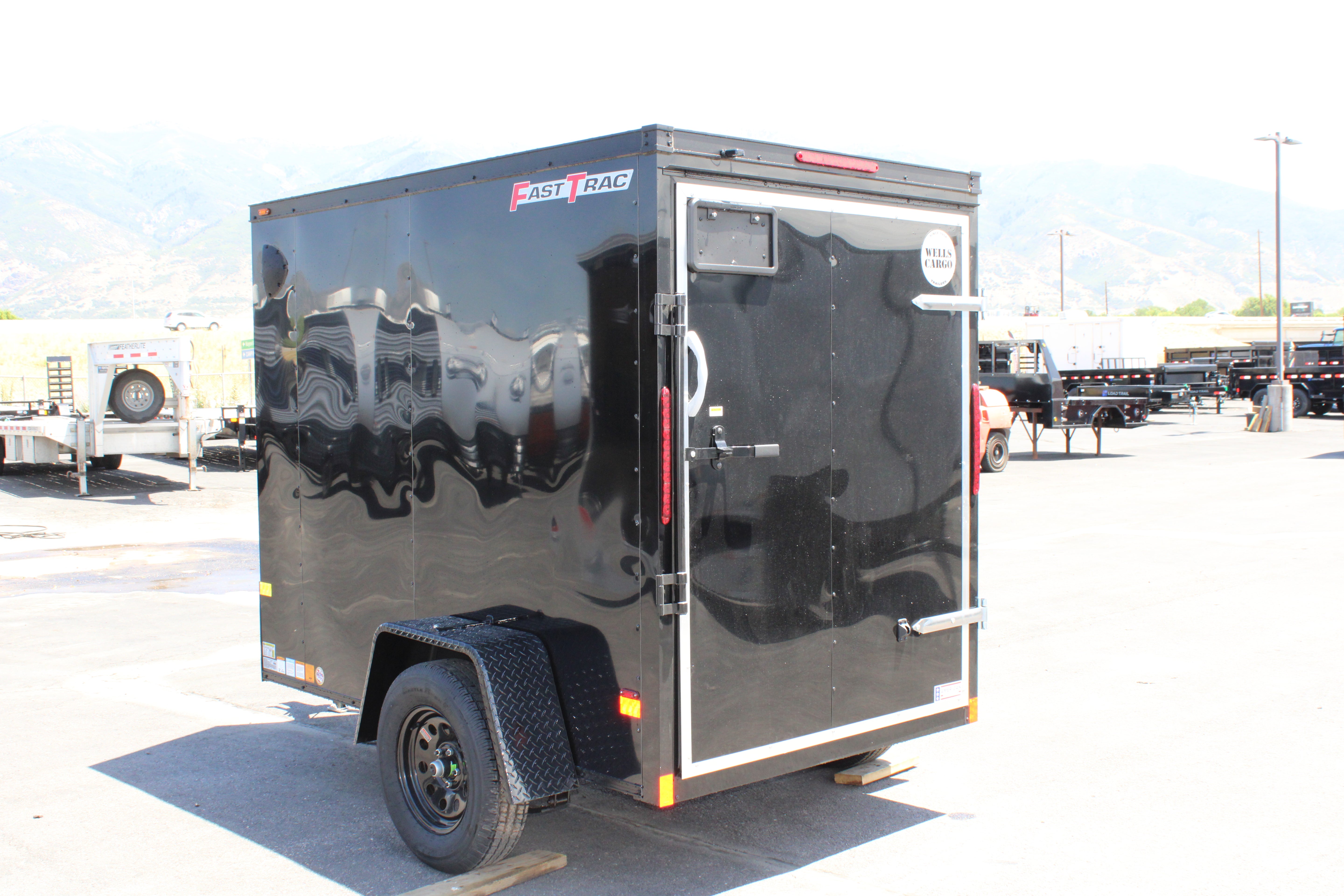 2025 Wells Cargo 5 x 8 Deluxe Enclosed Trailer