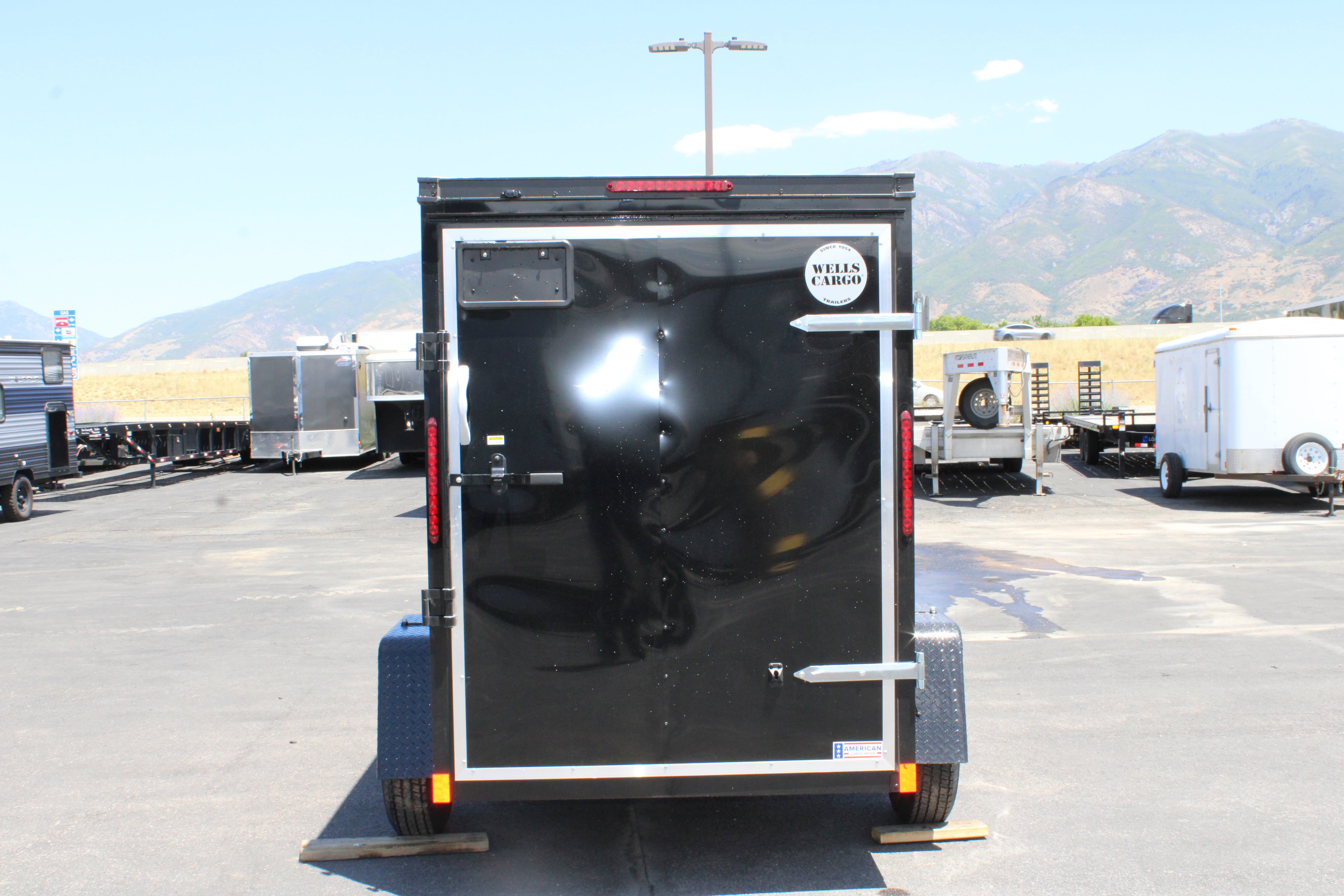 2025 Wells Cargo 5 x 8 Deluxe Enclosed Trailer