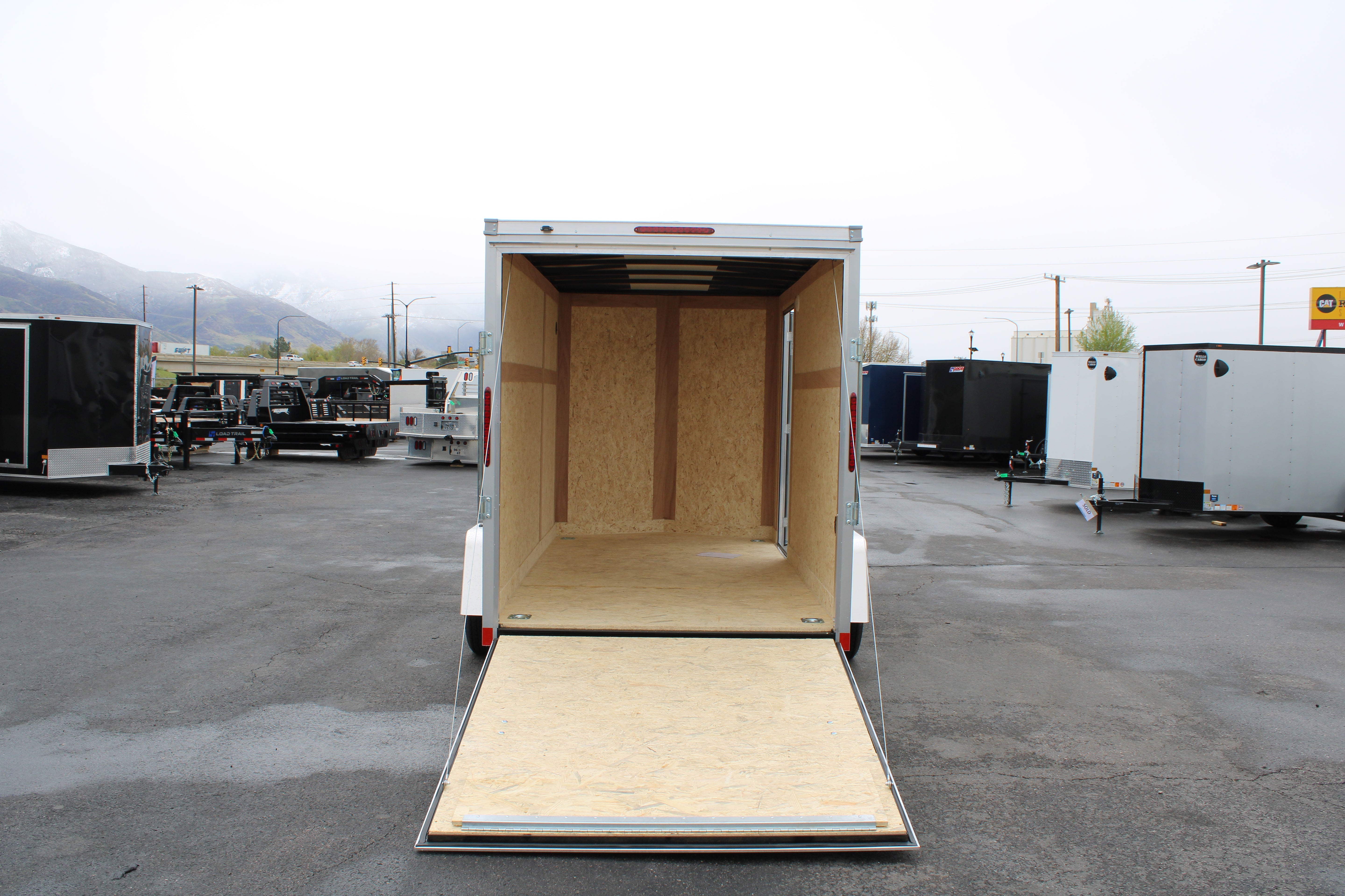 2025 Wells Cargo 6 x 12 Deluxe Enclosed Trailer