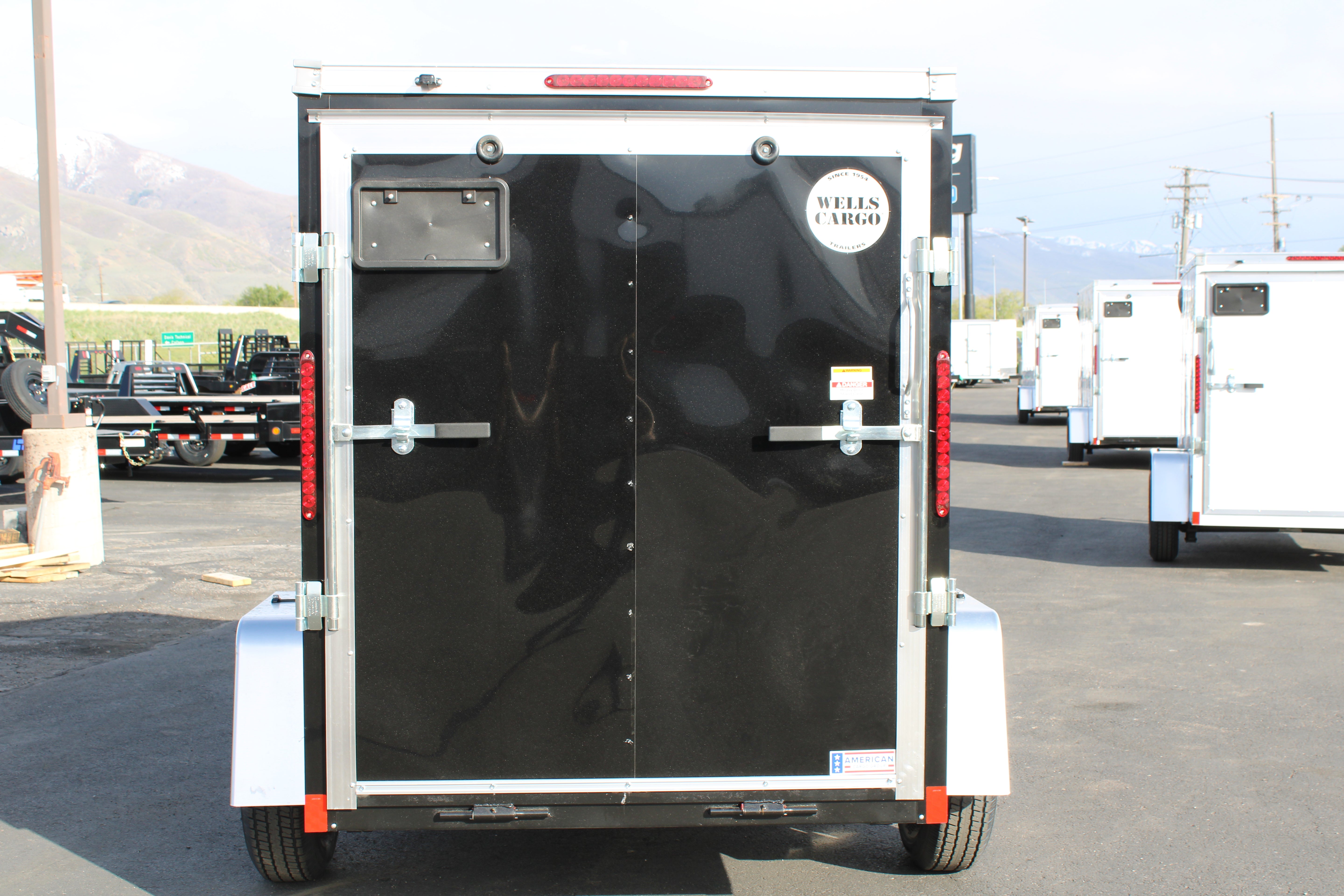 2025 Wells Cargo 5 x 8 Deluxe Enclosed Trailer