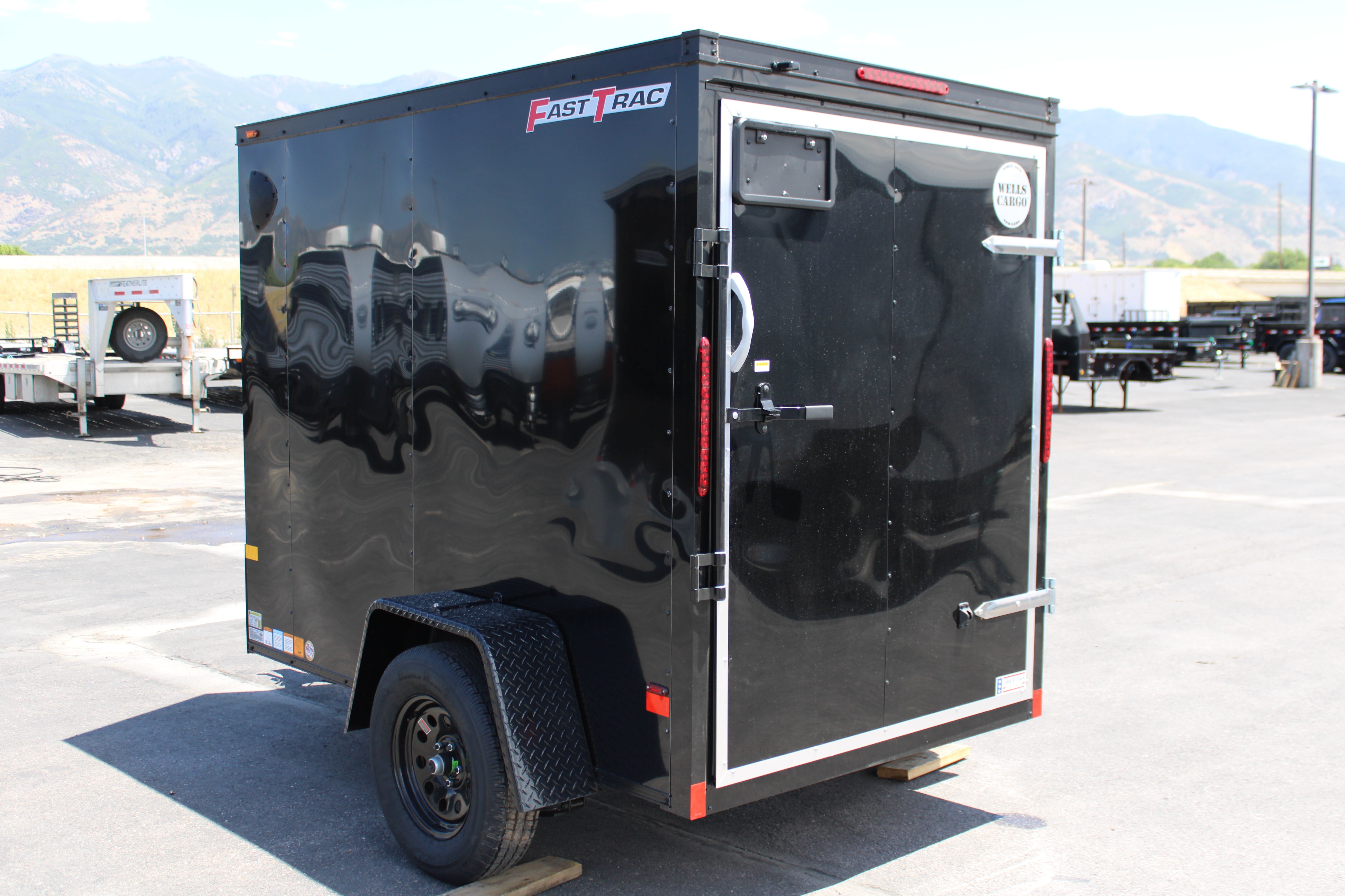 2025 Wells Cargo 5 x 8 Deluxe Enclosed Trailer