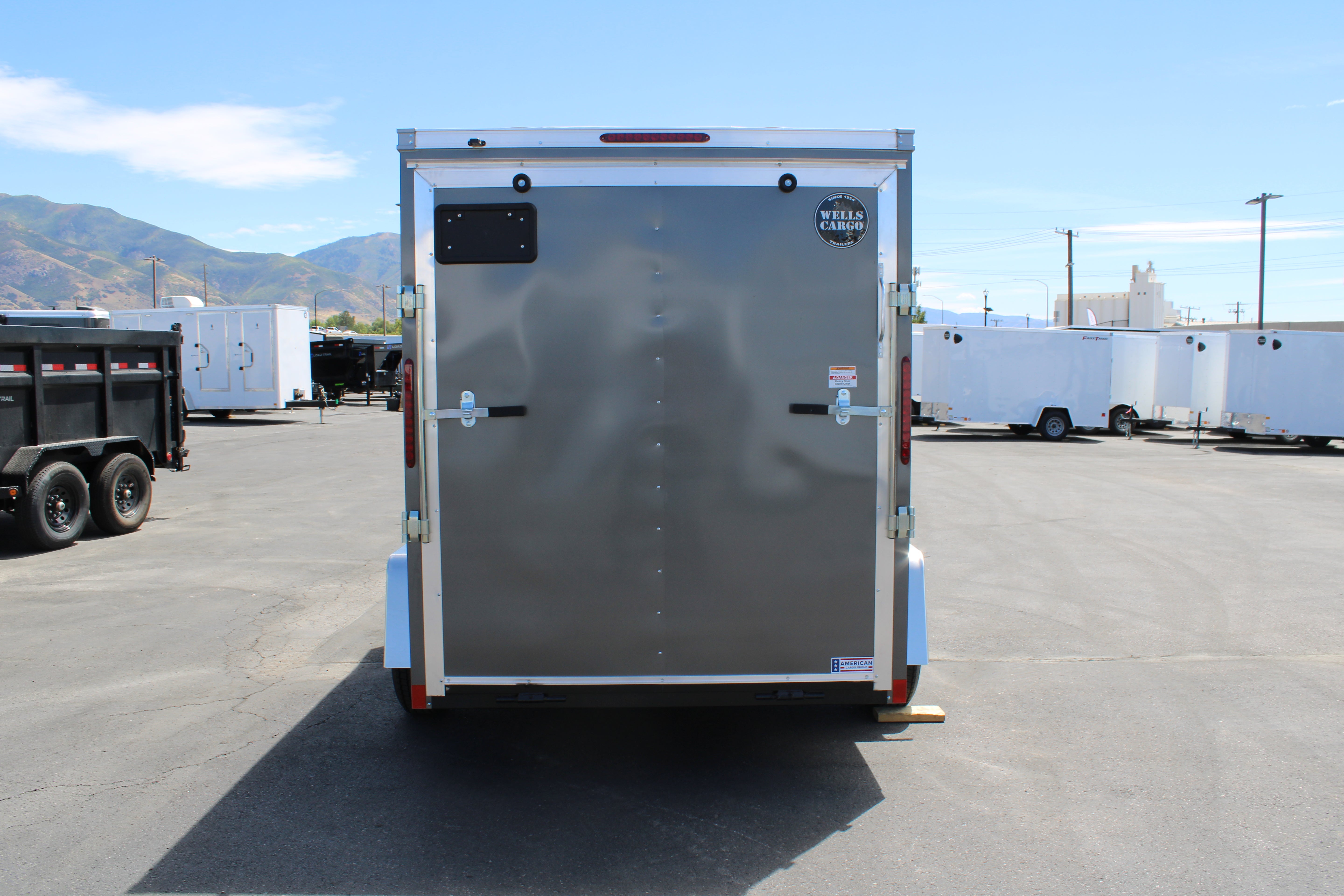 2026 Wells Cargo 6 x 10 Deluxe Enclosed Trailer