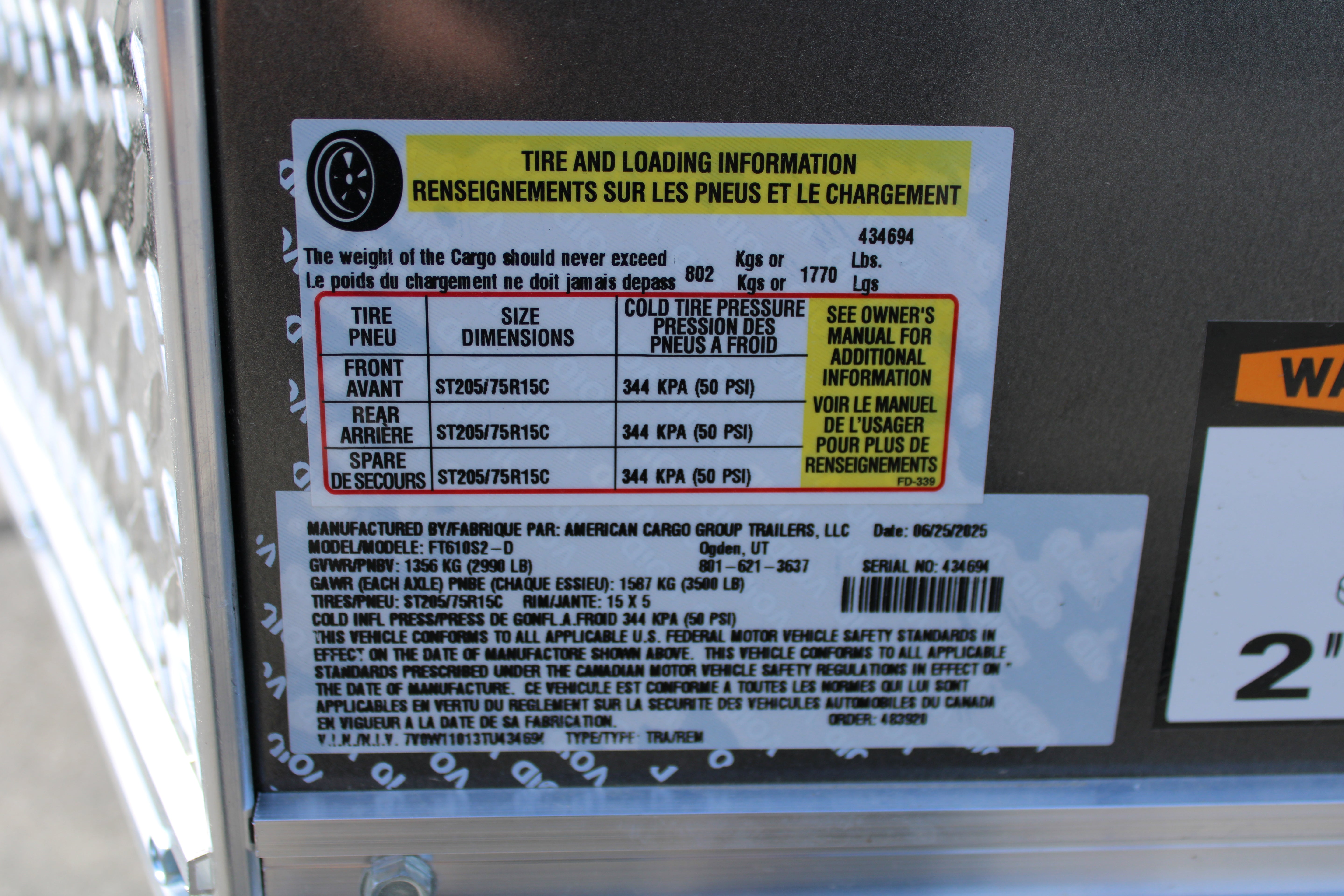 2026 Wells Cargo 6 x 10 Deluxe Enclosed Trailer
