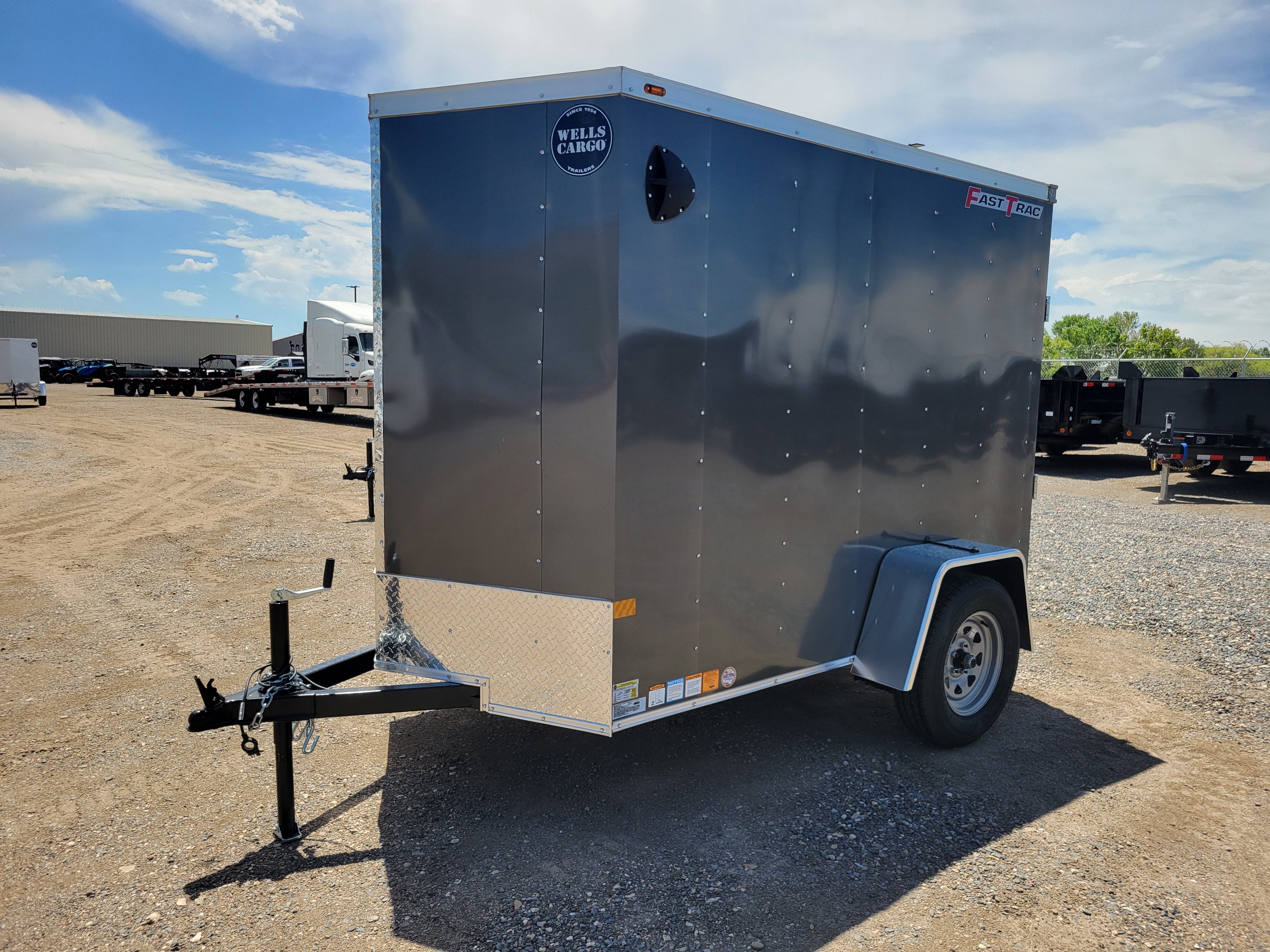 2024 Wells Cargo 5 x 8 Deluxe Enclosed Trailer