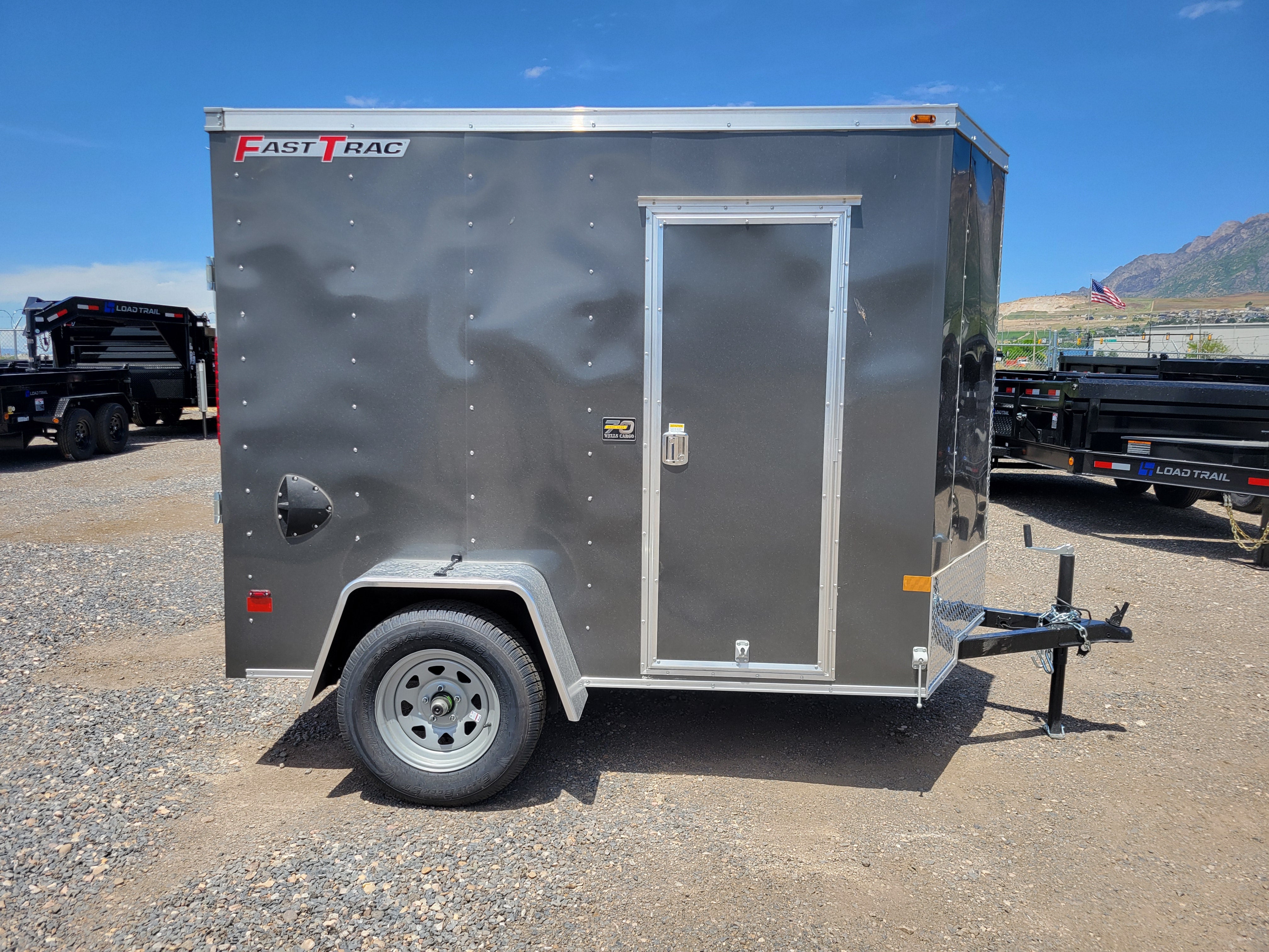 2024 Wells Cargo 5 x 8 Deluxe Enclosed Trailer