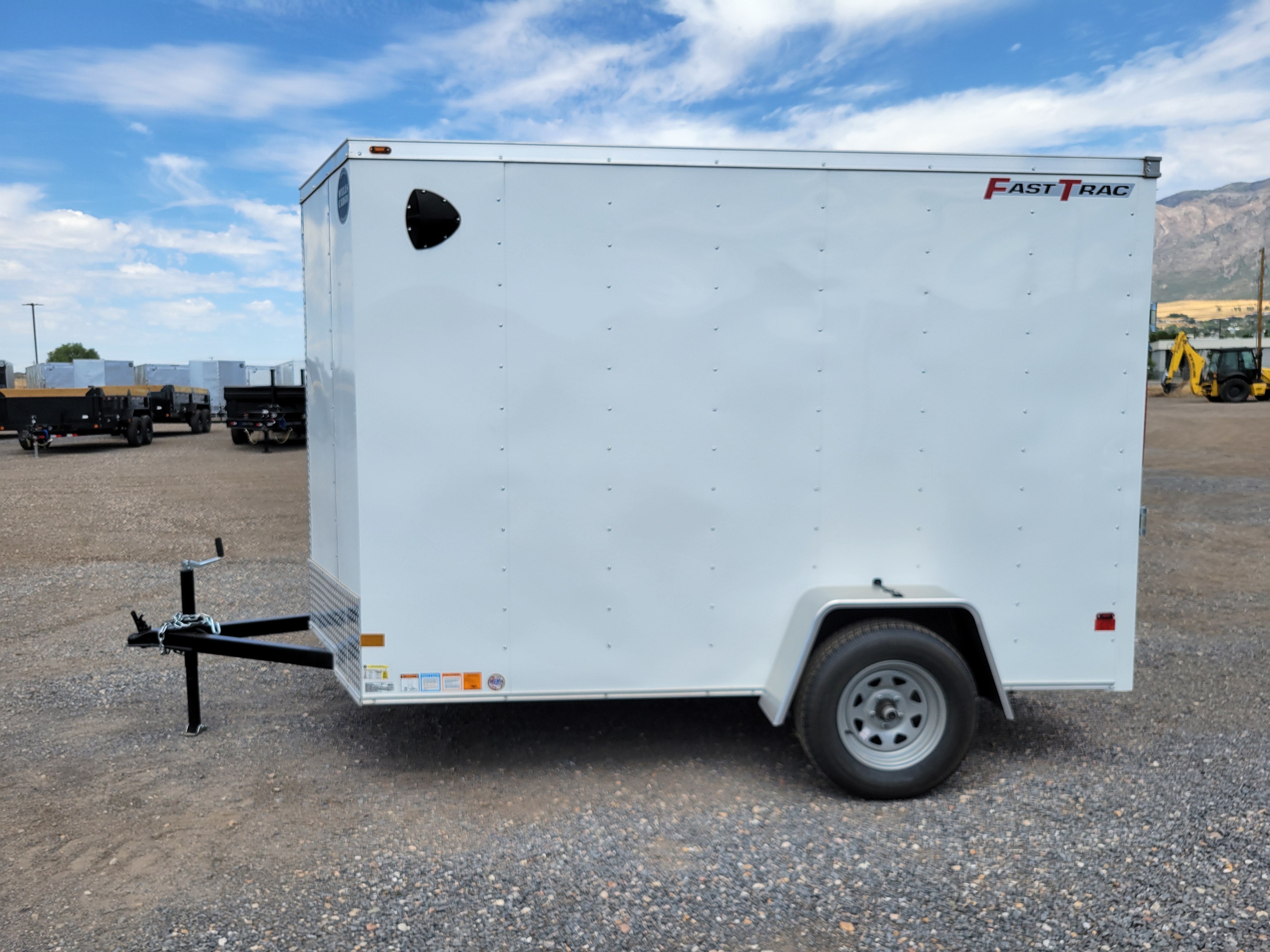 2025 Wells Cargo 6 x 10 Deluxe Enclosed Trailer