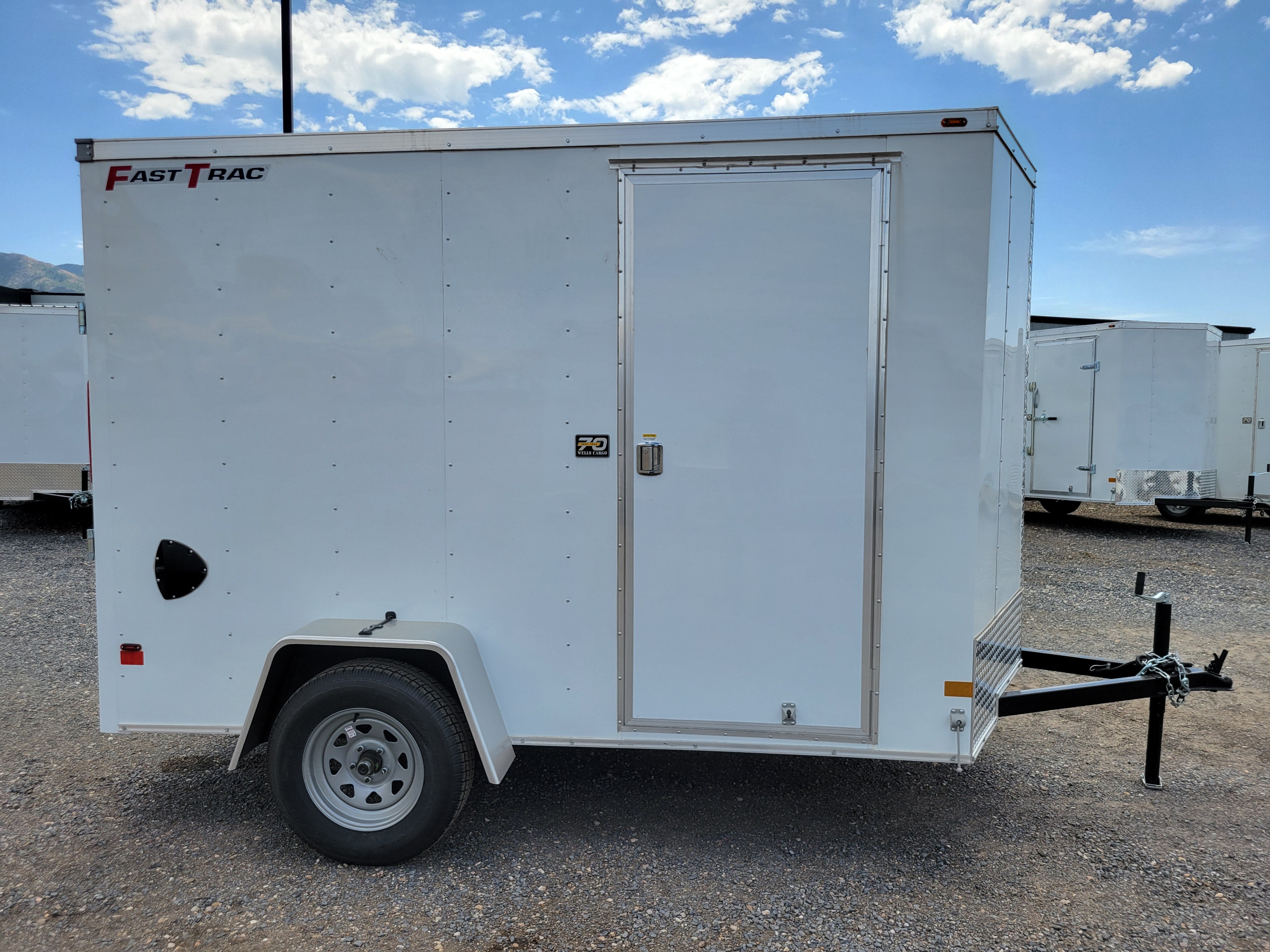 2025 Wells Cargo 6 x 10 Deluxe Enclosed Trailer