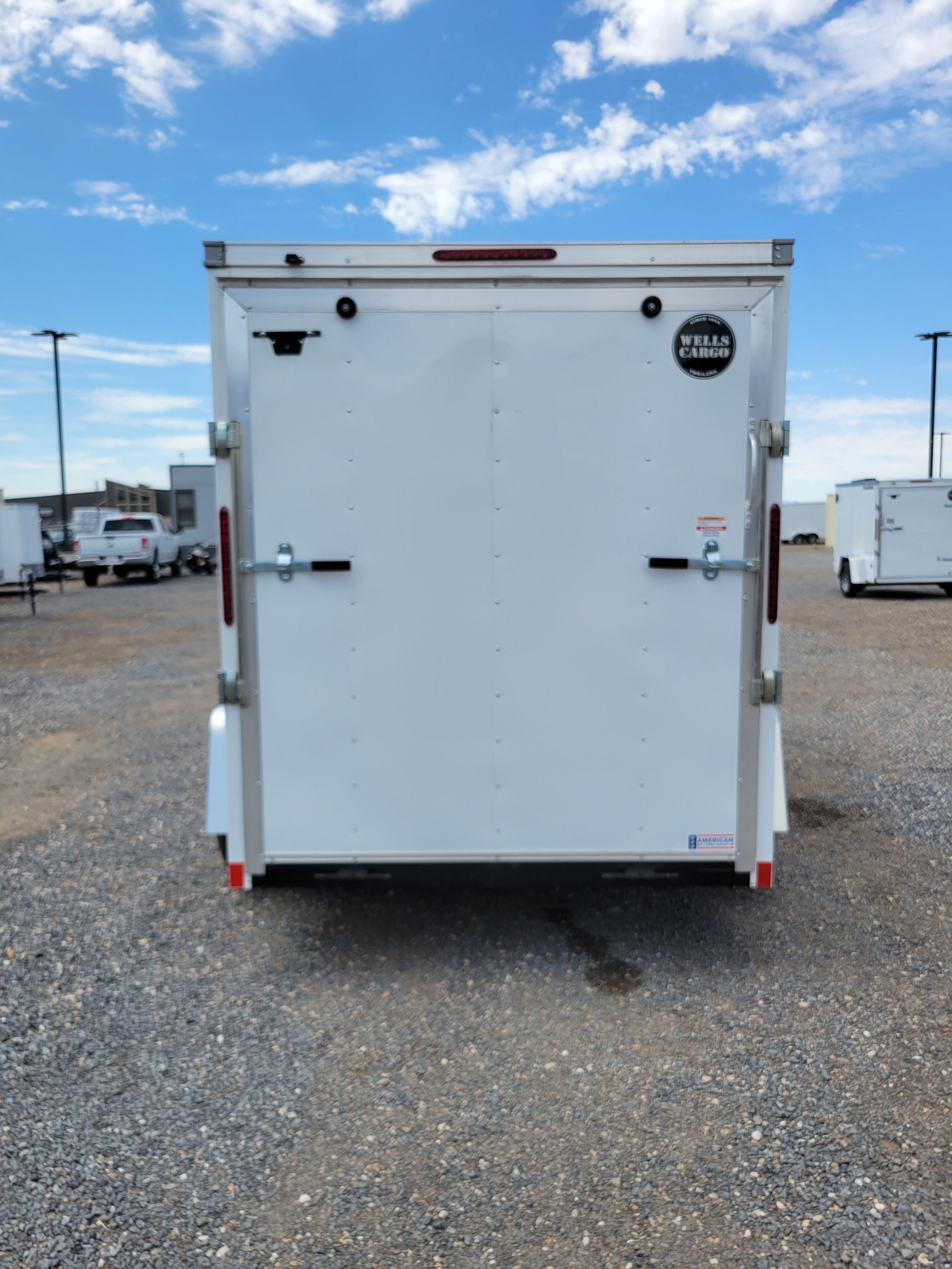 2025 Wells Cargo 6 x 10 Deluxe Enclosed Trailer