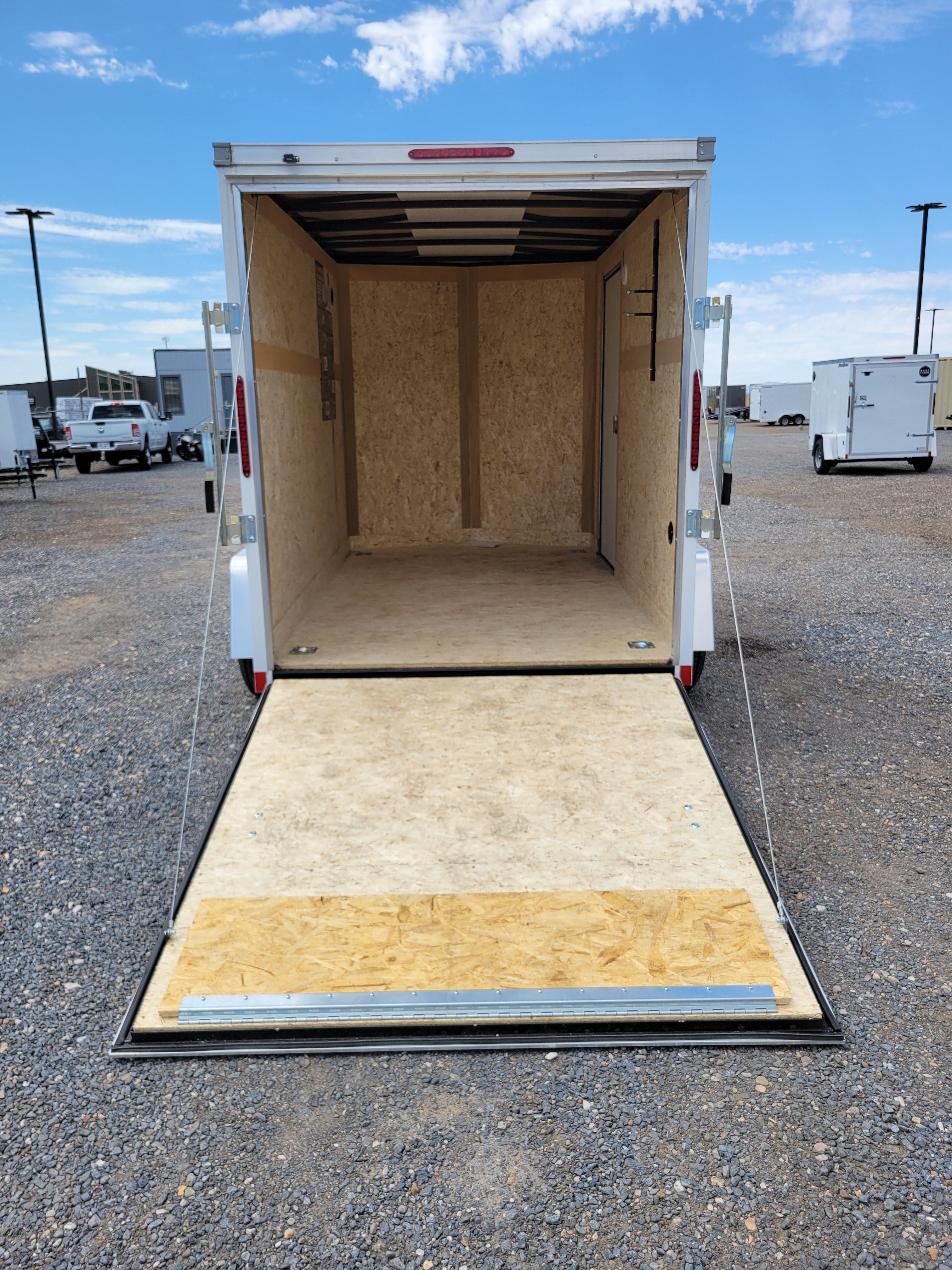 2025 Wells Cargo 6 x 10 Deluxe Enclosed Trailer