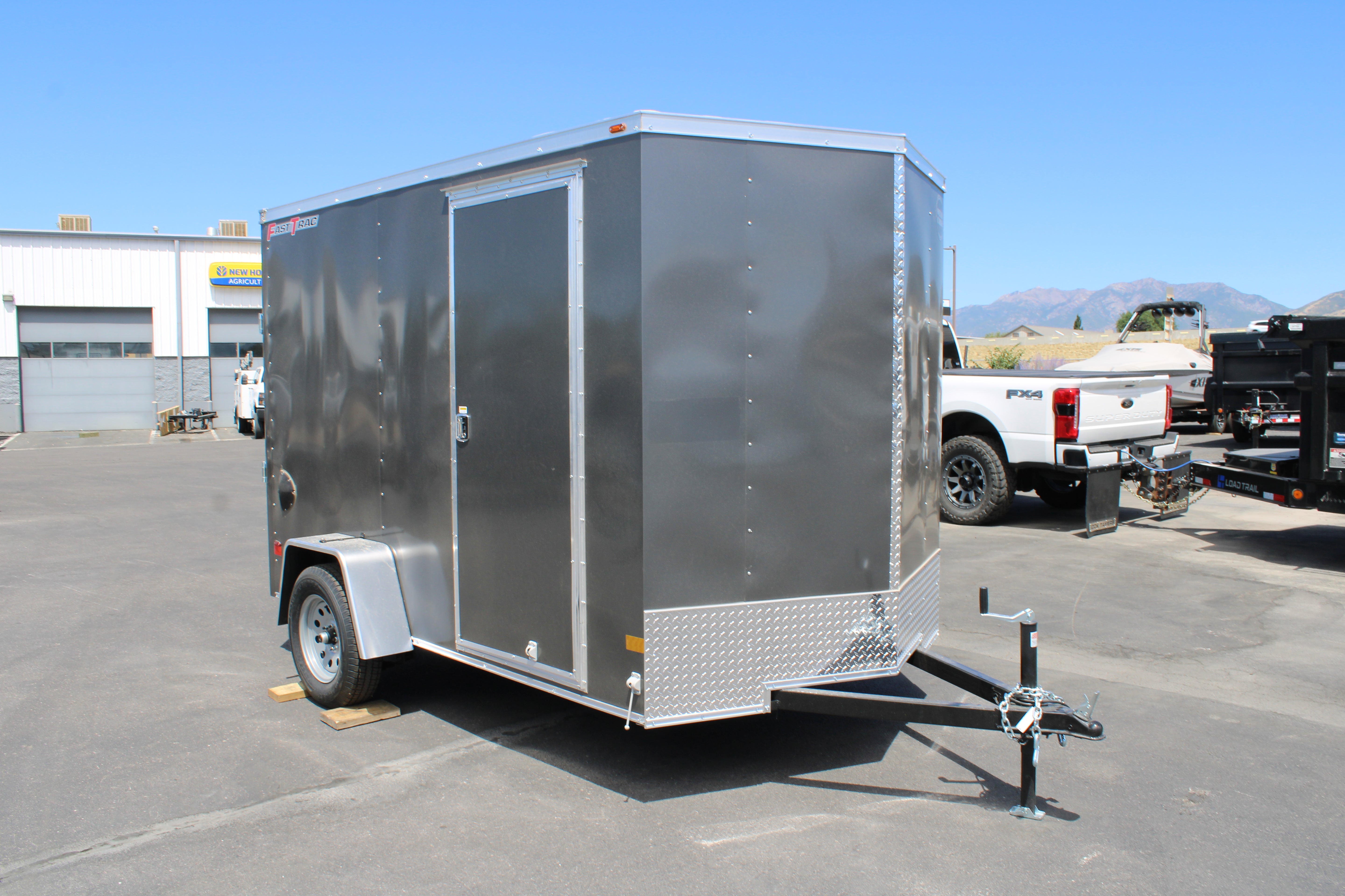 2026 Wells Cargo 6 x 10 Deluxe Enclosed Trailer