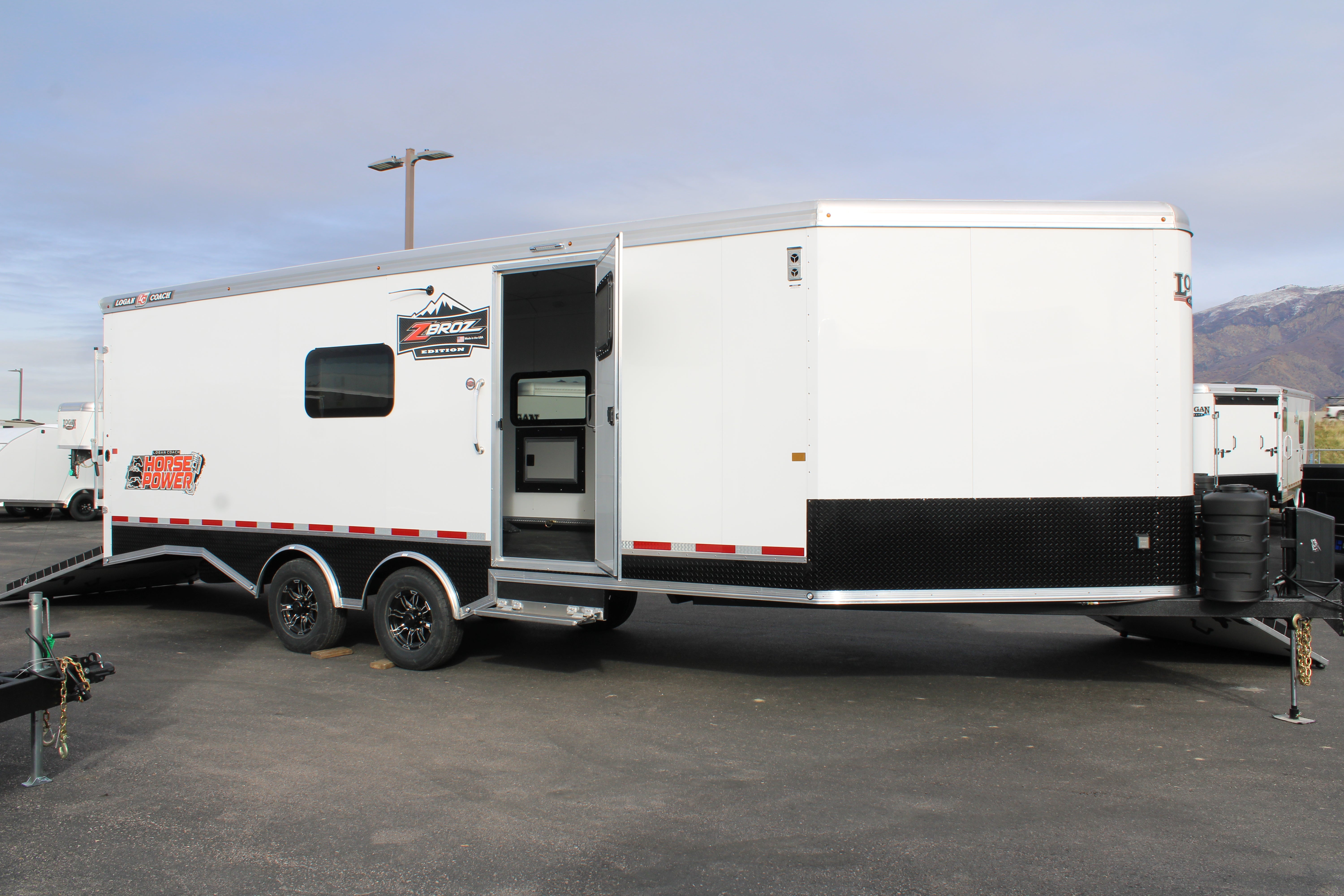 Logan Coach 29' HP Trailer